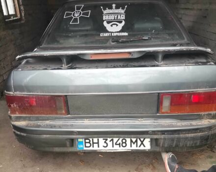 Серый Мазда 323, объемом двигателя 2 л и пробегом 200 тыс. км за 306 $, фото 1 на Automoto.ua