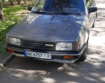 Серый Мазда 323, объемом двигателя 1.3 л и пробегом 3 тыс. км за 400 $, фото 1 на Automoto.ua