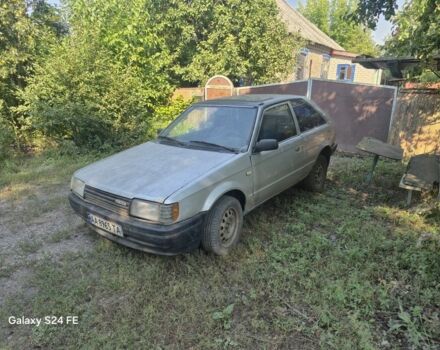 Сірий Мазда 323, об'ємом двигуна 1.5 л та пробігом 234 тис. км за 448 $, фото 1 на Automoto.ua