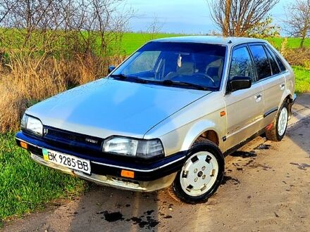 Сірий Мазда 323, об'ємом двигуна 1.3 л та пробігом 454 тис. км за 850 $, фото 1 на Automoto.ua
