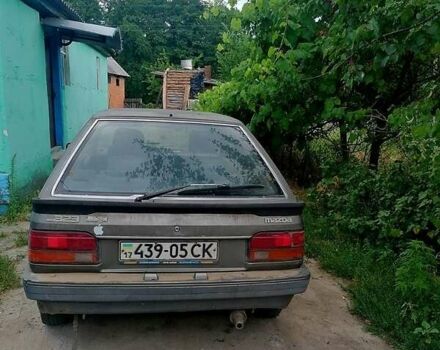 Серый Мазда 323, объемом двигателя 1.5 л и пробегом 500 тыс. км за 380 $, фото 1 на Automoto.ua
