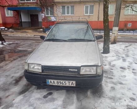 Серый Мазда 323, объемом двигателя 1.5 л и пробегом 230 тыс. км за 650 $, фото 1 на Automoto.ua
