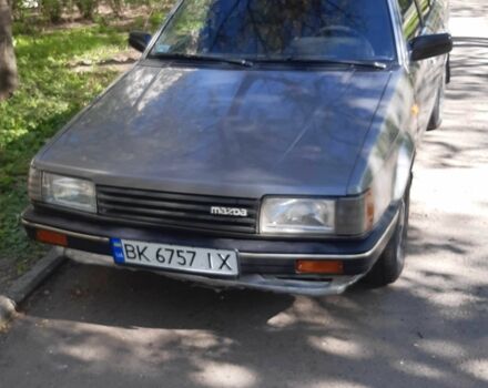 Серый Мазда 323, объемом двигателя 1.3 л и пробегом 353 тыс. км за 617 $, фото 1 на Automoto.ua