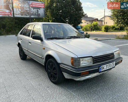 Сірий Мазда 323, об'ємом двигуна 1.32 л та пробігом 260 тис. км за 890 $, фото 1 на Automoto.ua