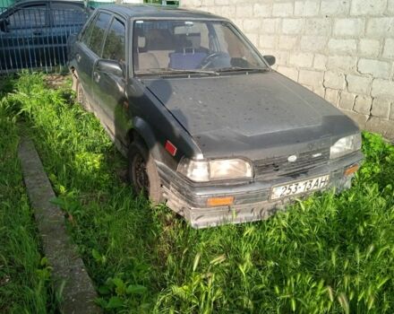 Серый Мазда 323, объемом двигателя 0 л и пробегом 999 тыс. км за 270 $, фото 1 на Automoto.ua