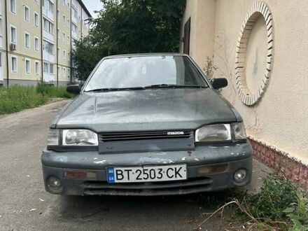 Мазда 323 1988 у Буче на Automoto.ua Сірий Мазда 323, об'ємом двигуна 1.32 л та пробігом 342 тис. км за 1100 $, фото 1 на Automoto.ua