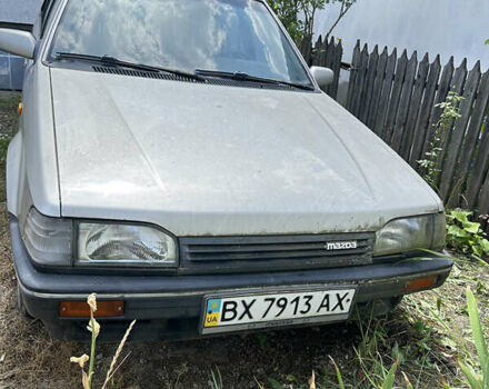 Серый Мазда 323, объемом двигателя 1.3 л и пробегом 200 тыс. км за 1001 $, фото 1 на Automoto.ua