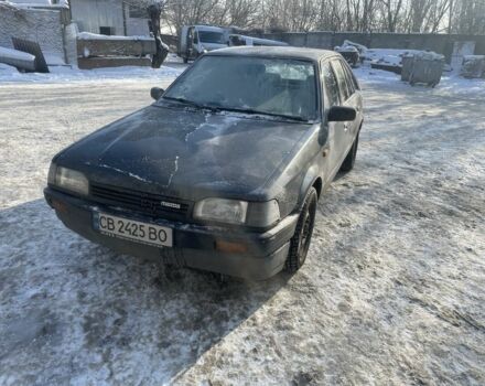 Серый Мазда 323, объемом двигателя 1.3 л и пробегом 442 тыс. км за 900 $, фото 1 на Automoto.ua
