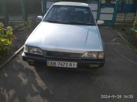 Мазда 323 1988 в Хмельнике на Automoto.ua Серый Мазда 323, объемом двигателя 1.3 л и пробегом 250 тыс. км за 989 $, фото 1 на Automoto.ua