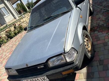 Серый Мазда 323, объемом двигателя 1.3 л и пробегом 300 тыс. км за 826 $, фото 1 на Automoto.ua