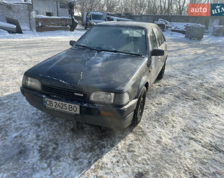 Серый Мазда 323, объемом двигателя 1.32 л и пробегом 442 тыс. км за 900 $, фото 1 на Automoto.ua