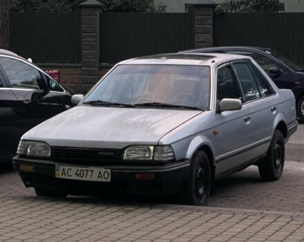 Серый Мазда 323, объемом двигателя 1.6 л и пробегом 227 тыс. км за 593 $, фото 1 на Automoto.ua