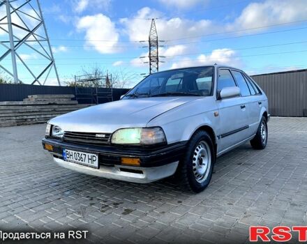 Сірий Мазда 323, об'ємом двигуна 1.3 л та пробігом 135 тис. км за 500 $, фото 1 на Automoto.ua