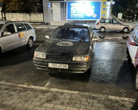 Серый Мазда 323, объемом двигателя 1.6 л и пробегом 550 тыс. км за 418 $, фото 1 на Automoto.ua