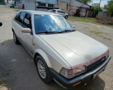 Сірий Мазда 323, об'ємом двигуна 1.3 л та пробігом 210 тис. км за 1700 $, фото 1 на Automoto.ua