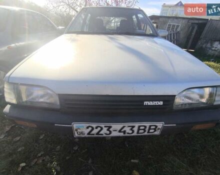 Серый Мазда 323, объемом двигателя 1.3 л и пробегом 212 тыс. км за 300 $, фото 1 на Automoto.ua