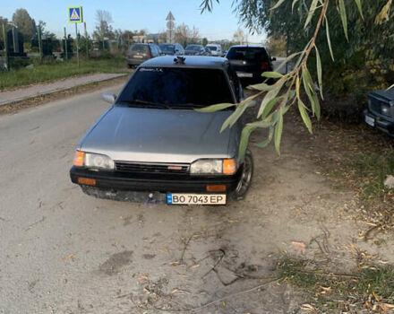 Сірий Мазда 323, об'ємом двигуна 1.32 л та пробігом 460 тис. км за 1000 $, фото 1 на Automoto.ua