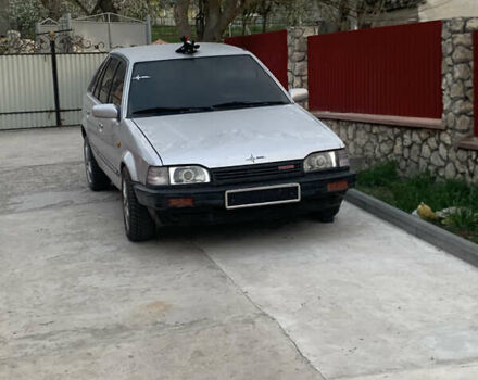 Серый Мазда 323, объемом двигателя 1.32 л и пробегом 460 тыс. км за 1500 $, фото 1 на Automoto.ua