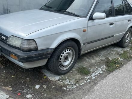 Серый Мазда 323, объемом двигателя 1.3 л и пробегом 3 тыс. км за 650 $, фото 1 на Automoto.ua