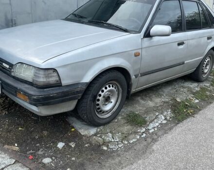 Серый Мазда 323, объемом двигателя 1.3 л и пробегом 3 тыс. км за 650 $, фото 1 на Automoto.ua
