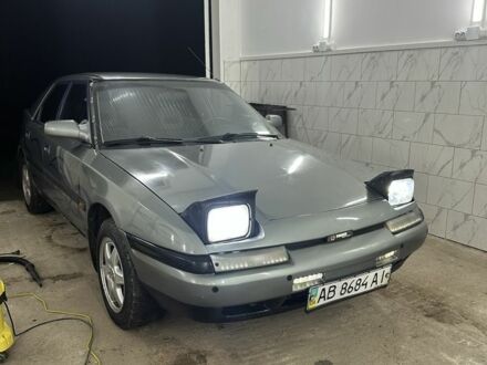 Сірий Мазда 323, об'ємом двигуна 1.8 л та пробігом 350 тис. км за 1400 $, фото 1 на Automoto.ua