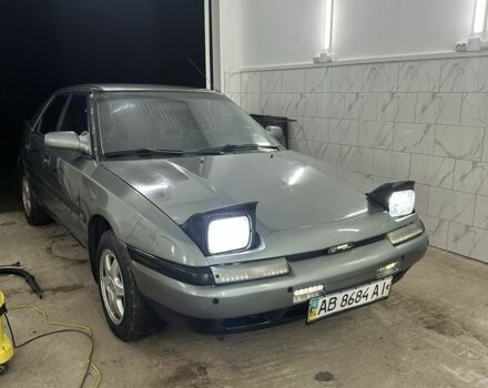 Серый Мазда 323, объемом двигателя 1.8 л и пробегом 350 тыс. км за 1400 $, фото 1 на Automoto.ua