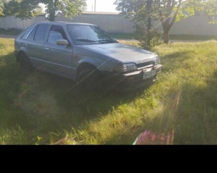Серый Мазда 323, объемом двигателя 0 л и пробегом 222 тыс. км за 200 $, фото 1 на Automoto.ua