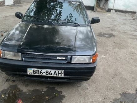 Серый Мазда 323, объемом двигателя 1.6 л и пробегом 150 тыс. км за 1500 $, фото 1 на Automoto.ua