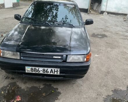 Серый Мазда 323, объемом двигателя 1.6 л и пробегом 150 тыс. км за 1500 $, фото 1 на Automoto.ua