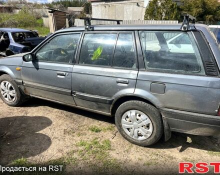 Серый Мазда 323, объемом двигателя 1.6 л и пробегом 350 тыс. км за 1200 $, фото 1 на Automoto.ua