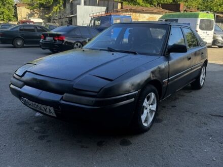 Серый Мазда 323, объемом двигателя 0 л и пробегом 188 тыс. км за 950 $, фото 1 на Automoto.ua