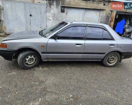 Сірий Мазда 323, об'ємом двигуна 1.3 л та пробігом 130 тис. км за 2500 $, фото 1 на Automoto.ua