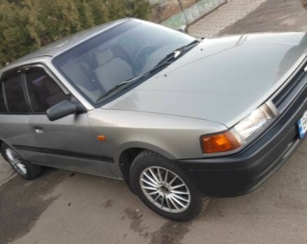 Сірий Мазда 323, об'ємом двигуна 1.5 л та пробігом 219 тис. км за 2000 $, фото 1 на Automoto.ua