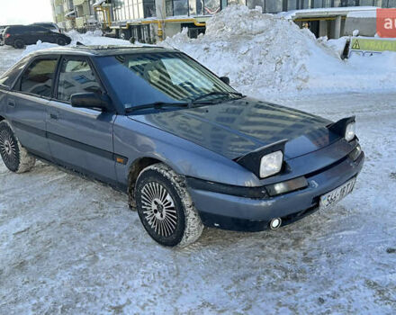 Сірий Мазда 323, об'ємом двигуна 1.84 л та пробігом 250 тис. км за 900 $, фото 1 на Automoto.ua