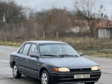 Серый Мазда 323, объемом двигателя 0 л и пробегом 100 тыс. км за 850 $, фото 1 на Automoto.ua