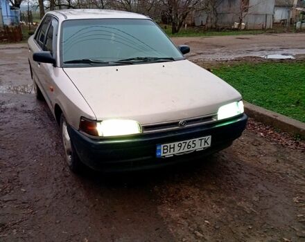 Сірий Мазда 323, об'ємом двигуна 1.3 л та пробігом 389 тис. км за 1650 $, фото 1 на Automoto.ua