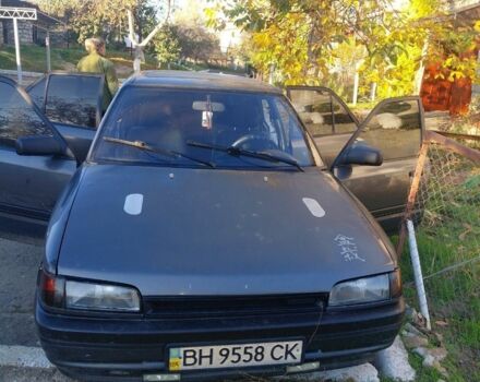 Серый Мазда 323, объемом двигателя 1.7 л и пробегом 29 тыс. км за 1600 $, фото 1 на Automoto.ua