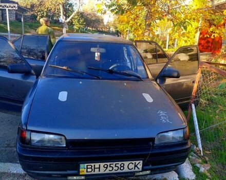 Серый Мазда 323, объемом двигателя 1.7 л и пробегом 290 тыс. км за 1200 $, фото 1 на Automoto.ua