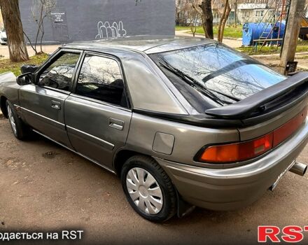 Сірий Мазда 323, об'ємом двигуна 1.6 л та пробігом 220 тис. км за 1150 $, фото 1 на Automoto.ua