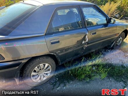 Сірий Мазда 323, об'ємом двигуна 1.6 л та пробігом 365 тис. км за 800 $, фото 1 на Automoto.ua