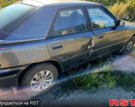 Сірий Мазда 323, об'ємом двигуна 1.6 л та пробігом 365 тис. км за 800 $, фото 1 на Automoto.ua