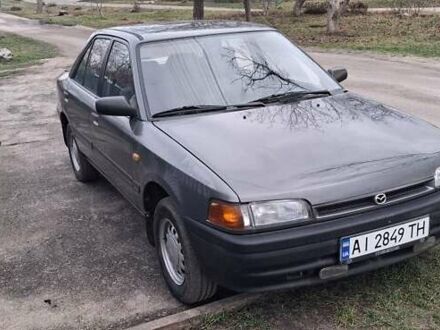 Сірий Мазда 323, об'ємом двигуна 1 л та пробігом 420 тис. км за 2700 $, фото 1 на Automoto.ua