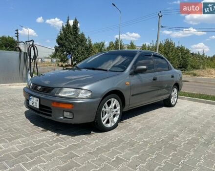 Сірий Мазда 323, об'ємом двигуна 1.49 л та пробігом 232 тис. км за 2600 $, фото 1 на Automoto.ua