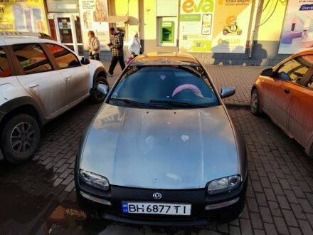 Сірий Мазда 323, об'ємом двигуна 1.5 л та пробігом 293 тис. км за 3000 $, фото 1 на Automoto.ua