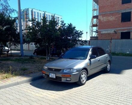 Сірий Мазда 323, об'ємом двигуна 1.5 л та пробігом 233 тис. км за 3600 $, фото 1 на Automoto.ua