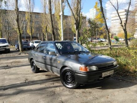 Сірий Мазда 323, об'ємом двигуна 1.3 л та пробігом 300 тис. км за 1500 $, фото 1 на Automoto.ua