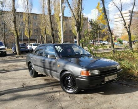 Серый Мазда 323, объемом двигателя 1.3 л и пробегом 300 тыс. км за 1500 $, фото 1 на Automoto.ua