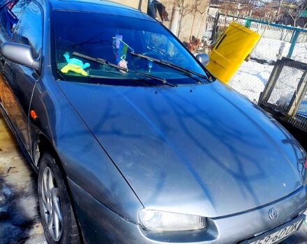 Серый Мазда 323, объемом двигателя 1.5 л и пробегом 303 тыс. км за 1500 $, фото 1 на Automoto.ua