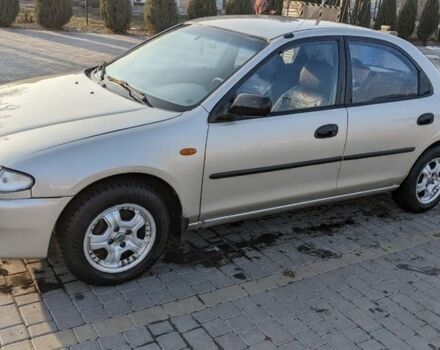 Серый Мазда 323, объемом двигателя 1.5 л и пробегом 270 тыс. км за 1700 $, фото 1 на Automoto.ua