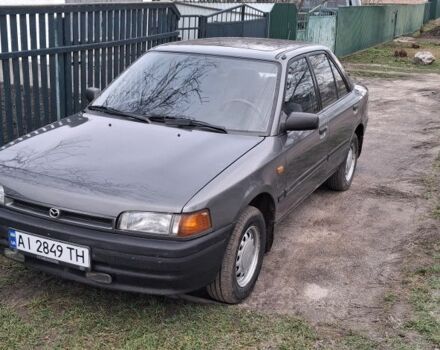 Серый Мазда 323, объемом двигателя 1 л и пробегом 420 тыс. км за 2700 $, фото 1 на Automoto.ua